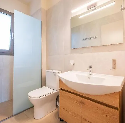 Апартаменты Arangia Garden Maisonette